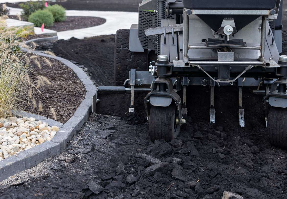 Force seed prep setup prepares ground for seeding around a tight corner 