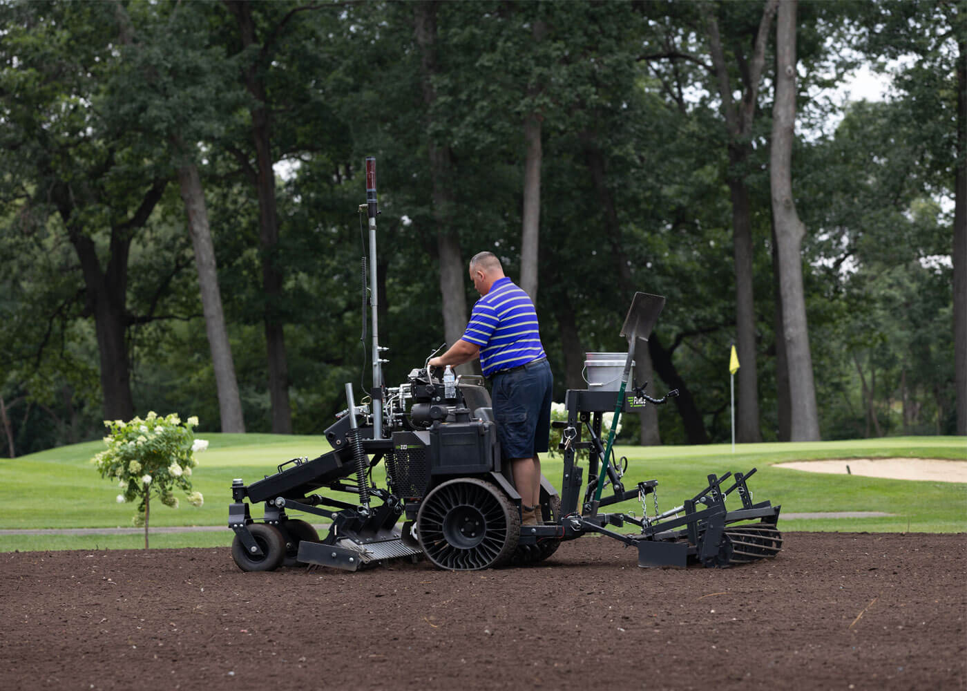 Force Z-23 working on a landscaping job near golf course 