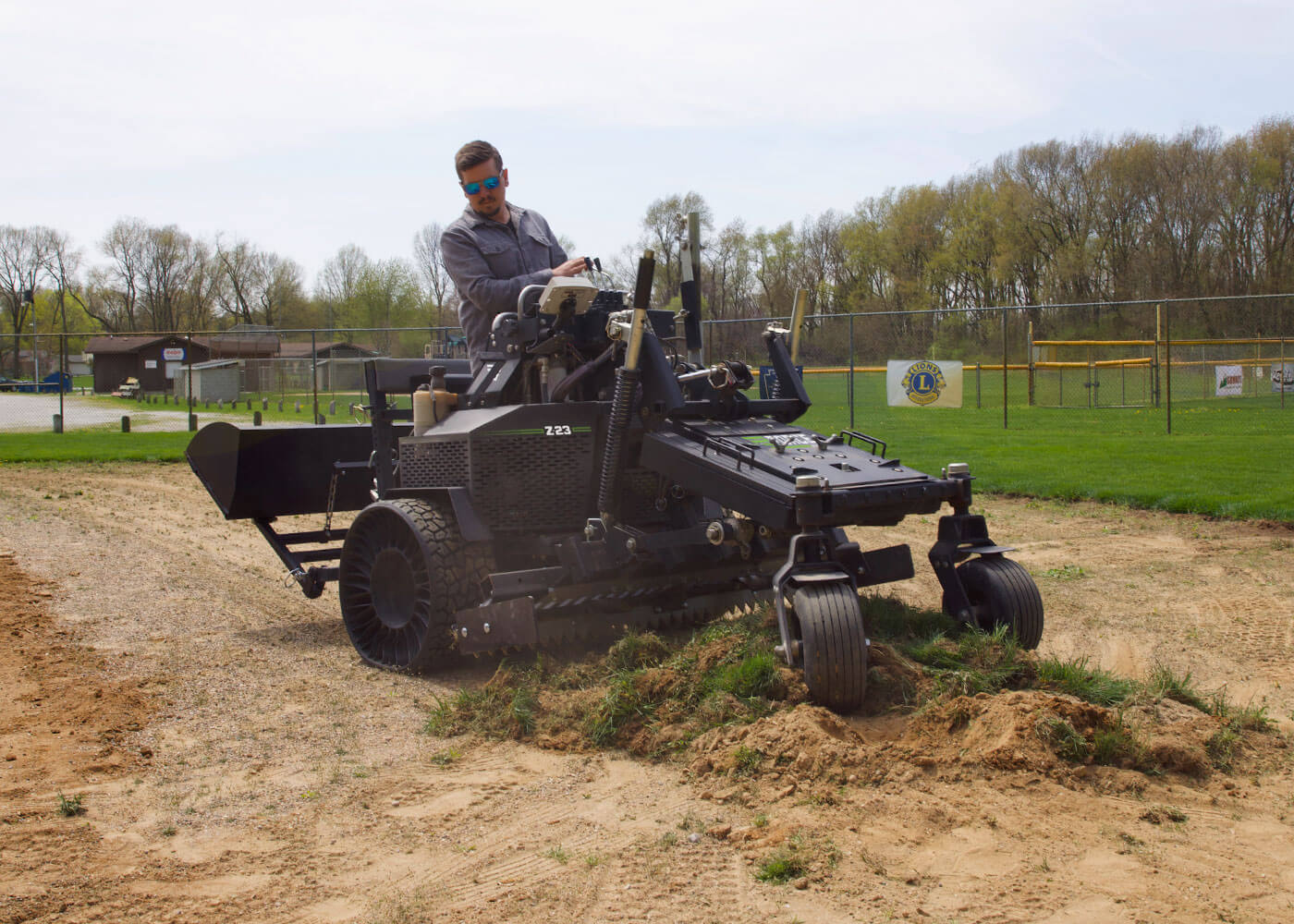 Force Z-23 with scoop attachment for infield renovation work 